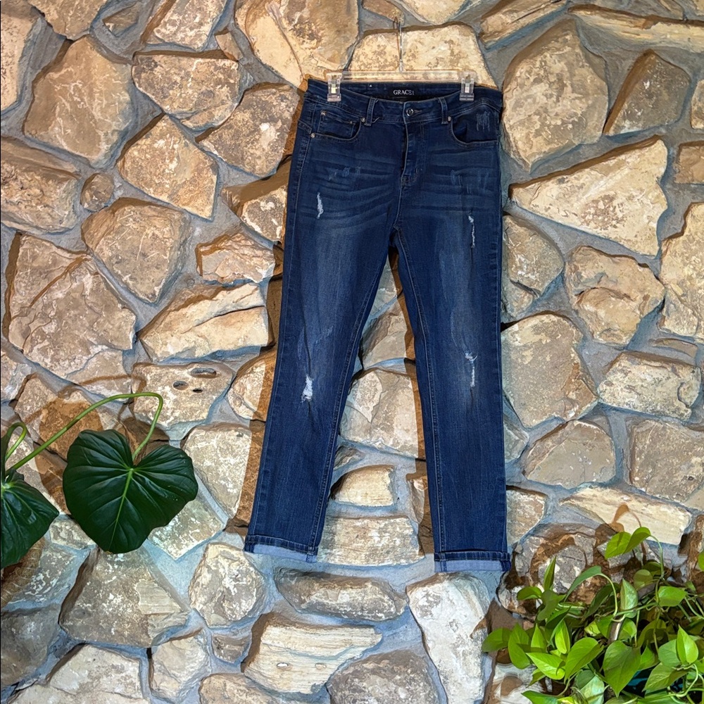 Stretchy straight leg jeans with factory distressing